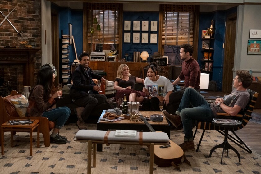 The cast in The How I Met Your Mother apartment.